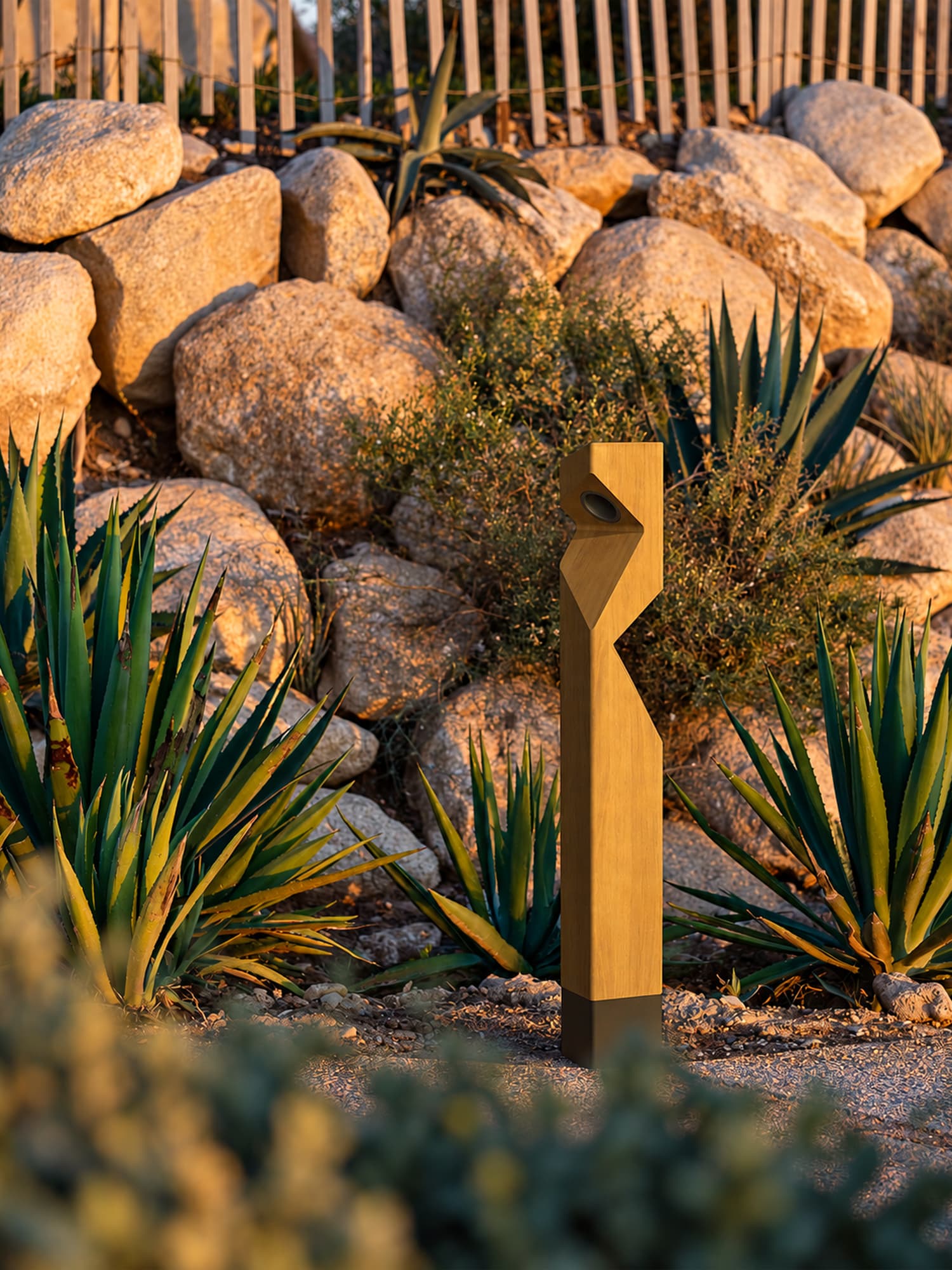 A wooden post with a contemporary design intended for outdoor lighting